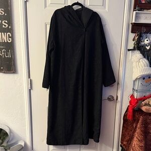 Reversible Raincoat with pocketsLike new condition. Back with Design & solid